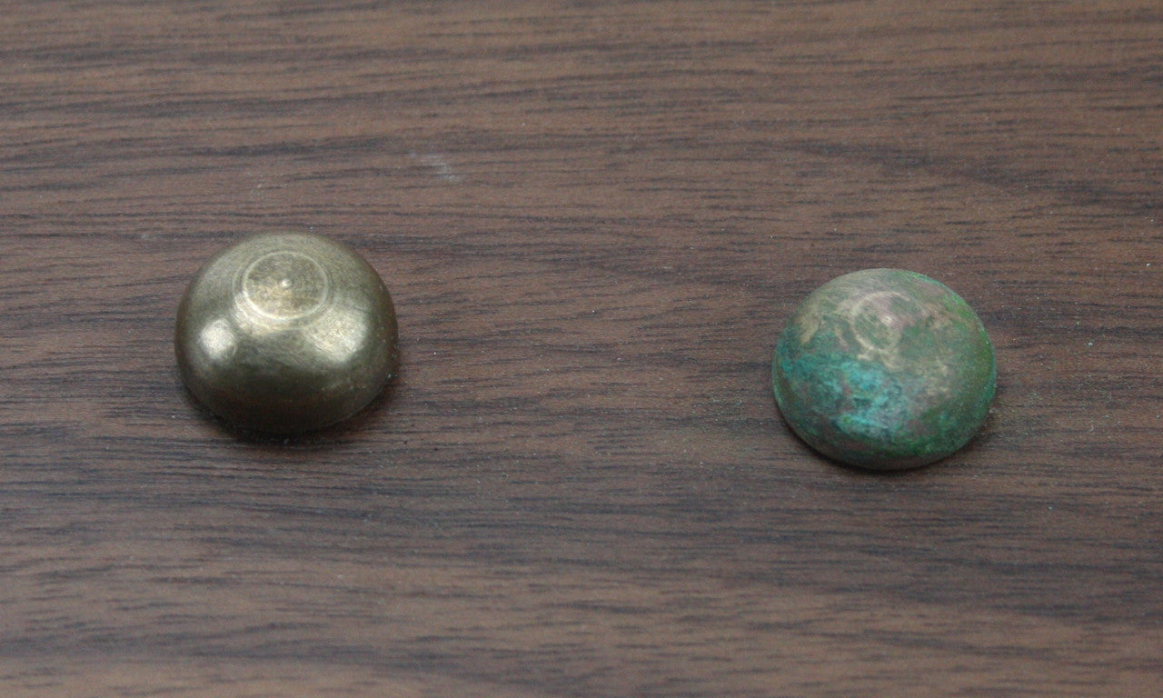 These brass and copper screw covers are used for hiding unsightly screws or fasteners, or as a highlight feature. Pictured are the aged brass and copper patina