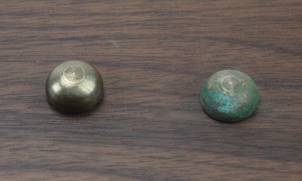 These brass and copper screw covers are used for hiding unsightly screws or fasteners, or as a highlight feature. Pictured are the aged brass and copper patina